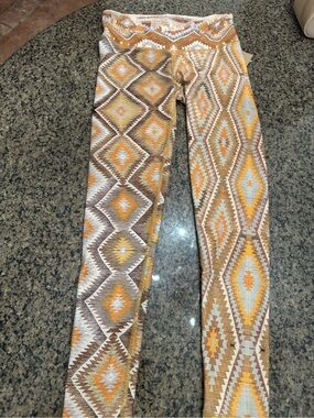 NEW Niyama Sol "KILIM" Geometric Patterned Leggings - Yellow and Brown